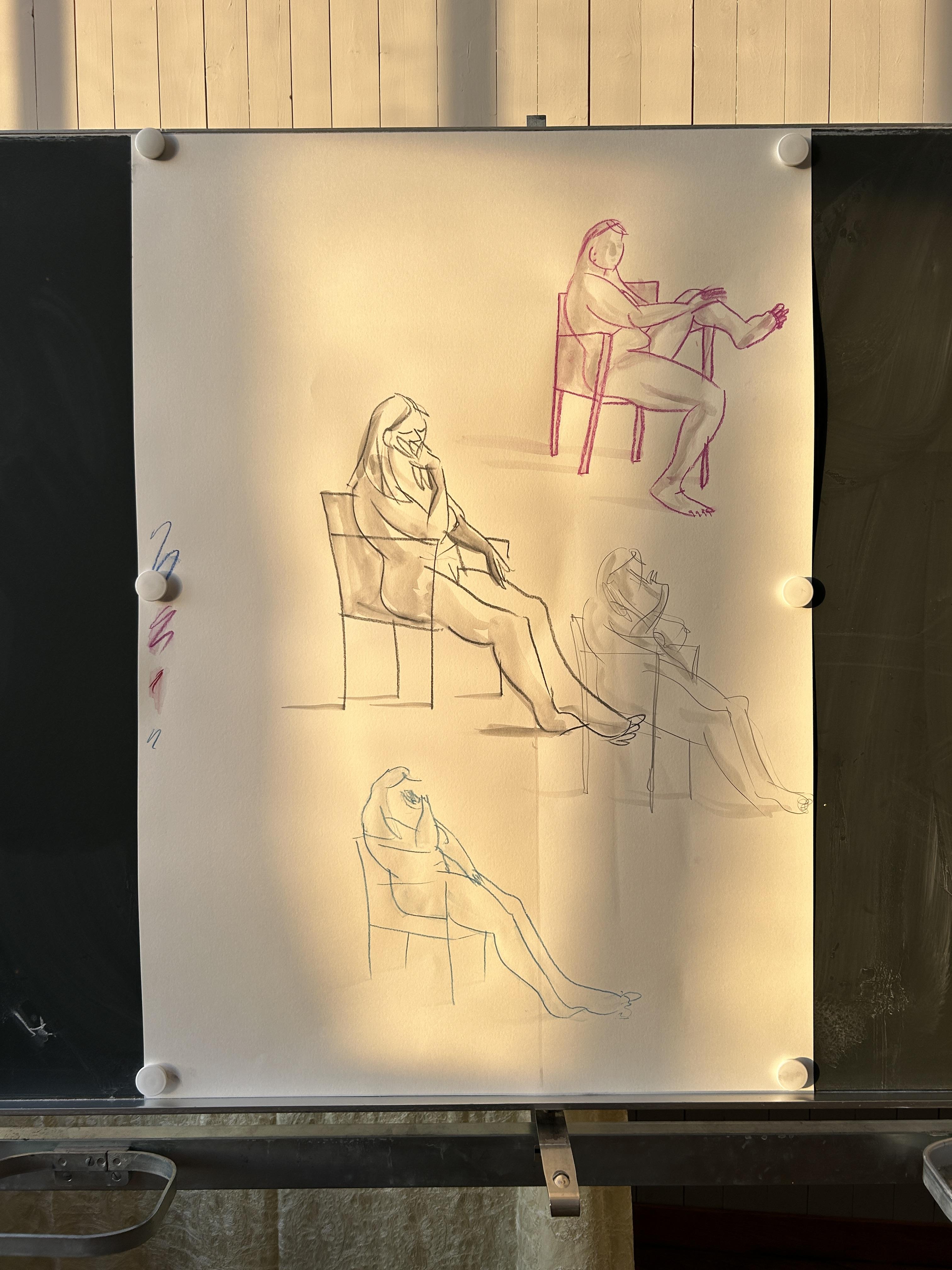 Figure drawing sketches on a magnetic blackboard